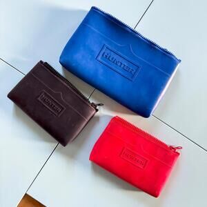 Hunter x Target bags, one large (blue) two smalls (red and black)